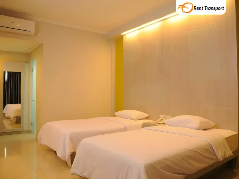Kamar Deluxe Double Room source by agoda.com