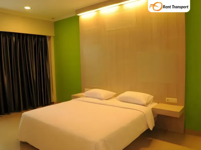 Kamar Deluxe Twin Room source by agoda.com